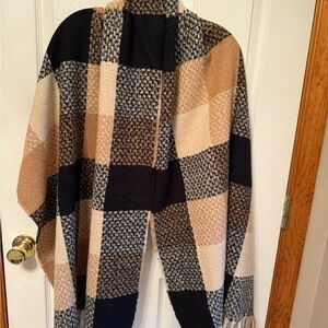 YE.ELOSSOM plaid blanket scarf with tassels.